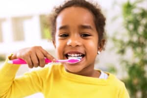 Little,Beautiful,African,Girl,Brushing,Teeth,,Healthy,Concept